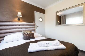 Фото номера Двухместный номер Делюкс с 1 кроватью Апарт-отели Villa 33 Blisko Plaży г. Сопот 7