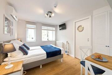 Фото номера Двухместный номер с 1 кроватью Апартаменты Anchor House Sopot г. Сопот 24