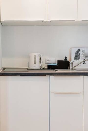 Фото номера Трехместный номер, с мини-кухней Проживание в семье Sopot Loft г. Сопот 24