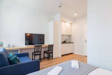 Фото номера Трехместный номер, с мини-кухней Проживание в семье Sopot Loft г. Сопот 13