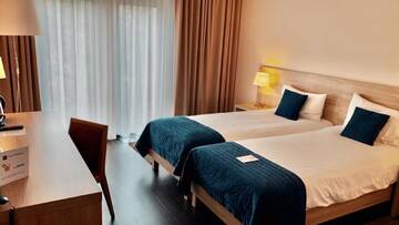 Фото номера Двухместный номер с 2 отдельными кроватями и видом на город Отель Hotel Molo г. Сопот 5