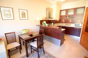 Фото номера Апартаменты с 1 спальней Апартаменты Victus Apartament Platinium г. Сопот 27