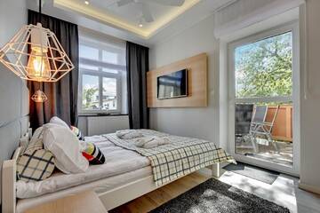 Фото номера Апартаменты с 2 спальнями Апартаменты Lion Apartments - NEMO Deluxe г. Сопот 9