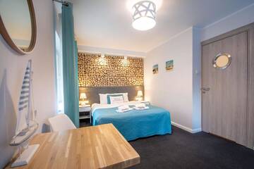 Фото номера Двухместный номер с 1 кроватью Апартаменты Beach House - przy plaży г. Сопот 8