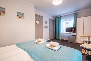 Фото номера Двухместный номер с 1 кроватью Апартаменты Beach House - przy plaży г. Сопот 11