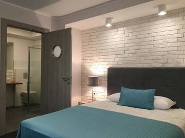 Фото номера Двухместный номер с 1 кроватью Апартаменты Beach House - przy plaży г. Сопот 17