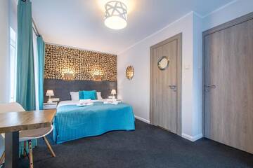 Фото номера Двухместный номер с 1 кроватью Апартаменты Beach House - przy plaży г. Сопот 13
