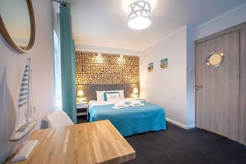 Фото номера Двухместный номер с 1 кроватью Апартаменты Beach House - przy plaży г. Сопот 4