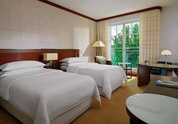 Фото номера Улучшенный номер с 2 отдельными/односпальными кроватями Отель Sheraton Sopot Hotel г. Сопот 3